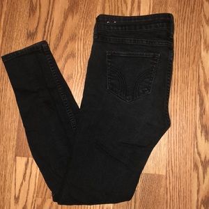 Distressed black skinny jeans